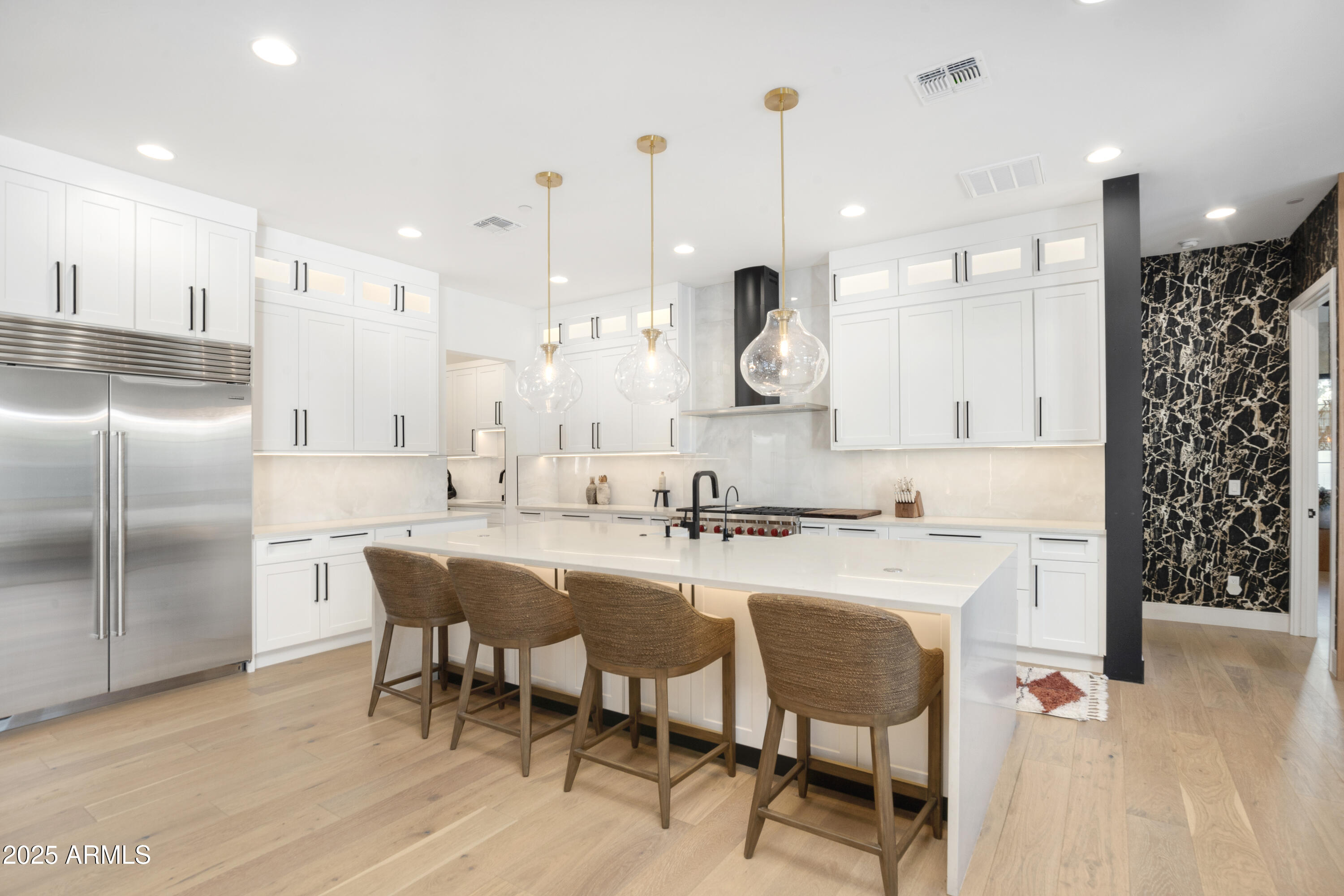 2912 East Pierson Street Phoenix, AZ 85016 - Photo 7 of 39 a large kitchen with a table and chairs