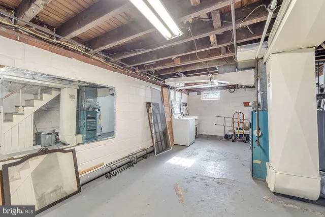 a view of a brick house with large windows