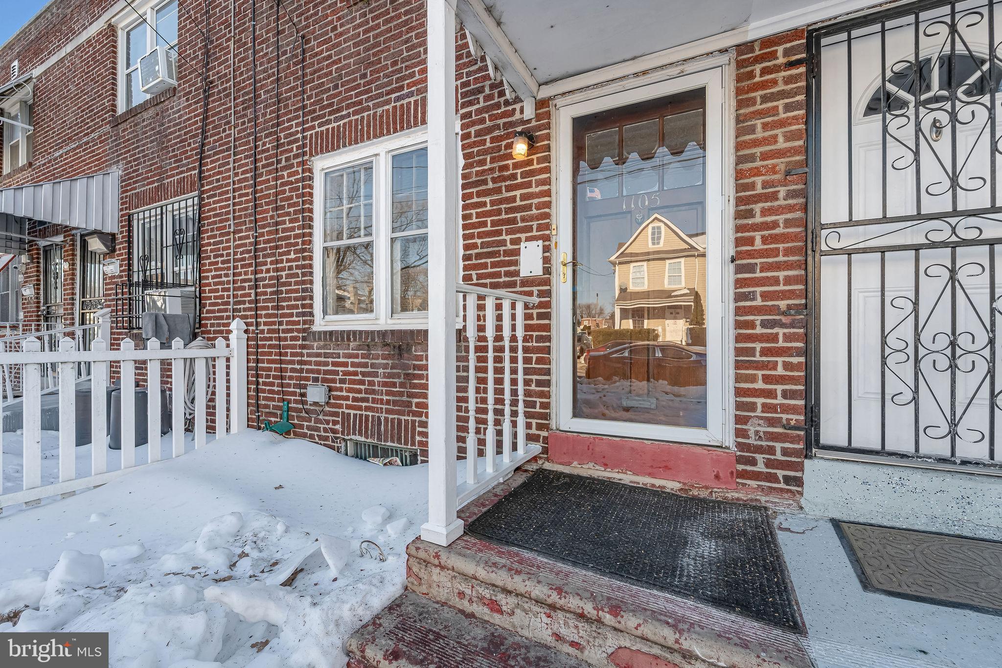 1105 North 21st Street Camden, NJ 08105 - Photo 14 of 15 a view of a brick house with large windows