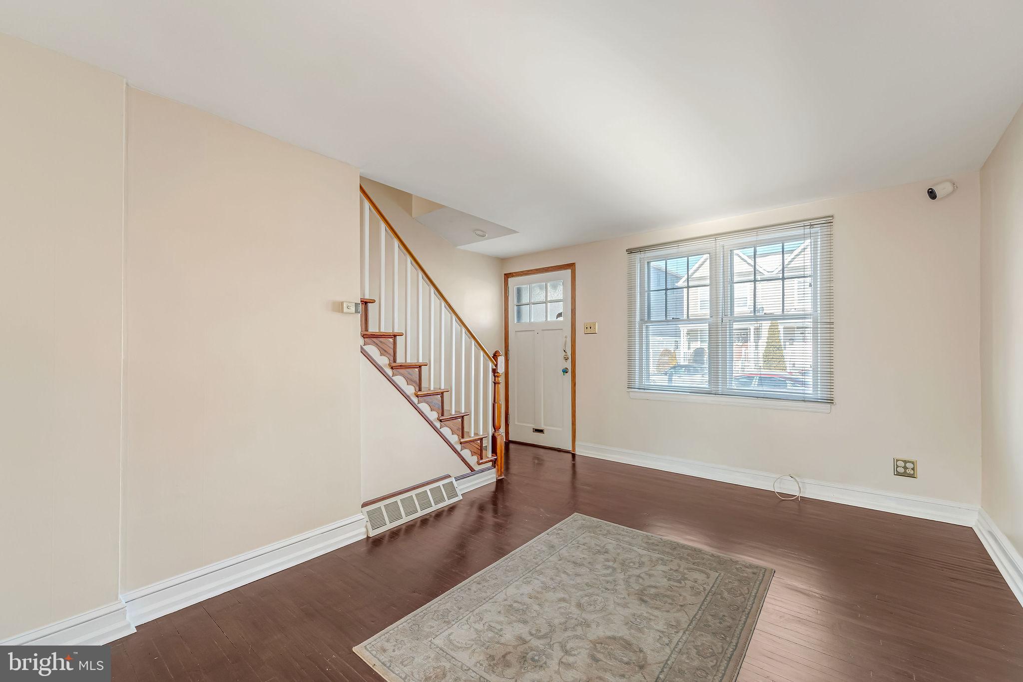 1105 North 21st Street Camden, NJ 08105 - Photo 4 of 15 a view of an entryway with wooden floor
