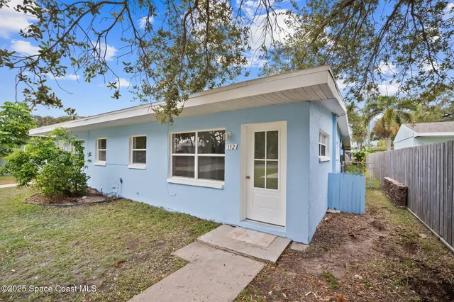 a view of a bedroom with a window