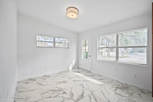 a kitchen with stainless steel appliances granite countertop a stove sink and cabinets