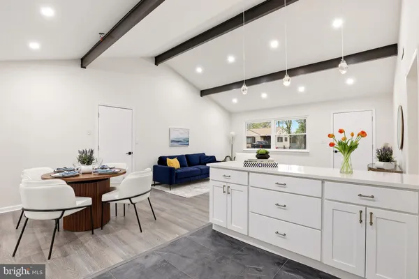 a kitchen with counter and sink