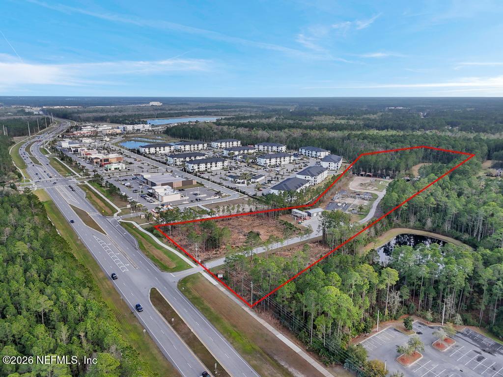 4280 Race Track Road St. Johns, FL 32259 - Photo 3 of 12 an aerial view of residential houses with outdoor space