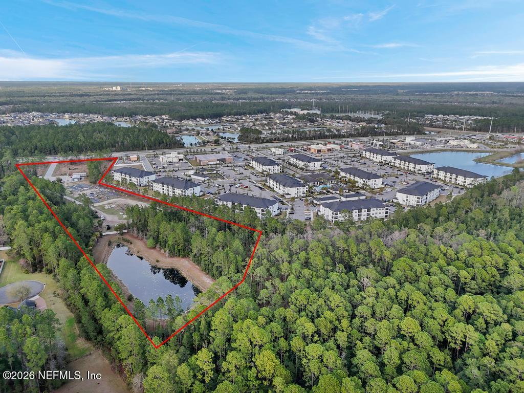 4280 Race Track Road St. Johns, FL 32259 - Photo 7 of 12 an aerial view of a city