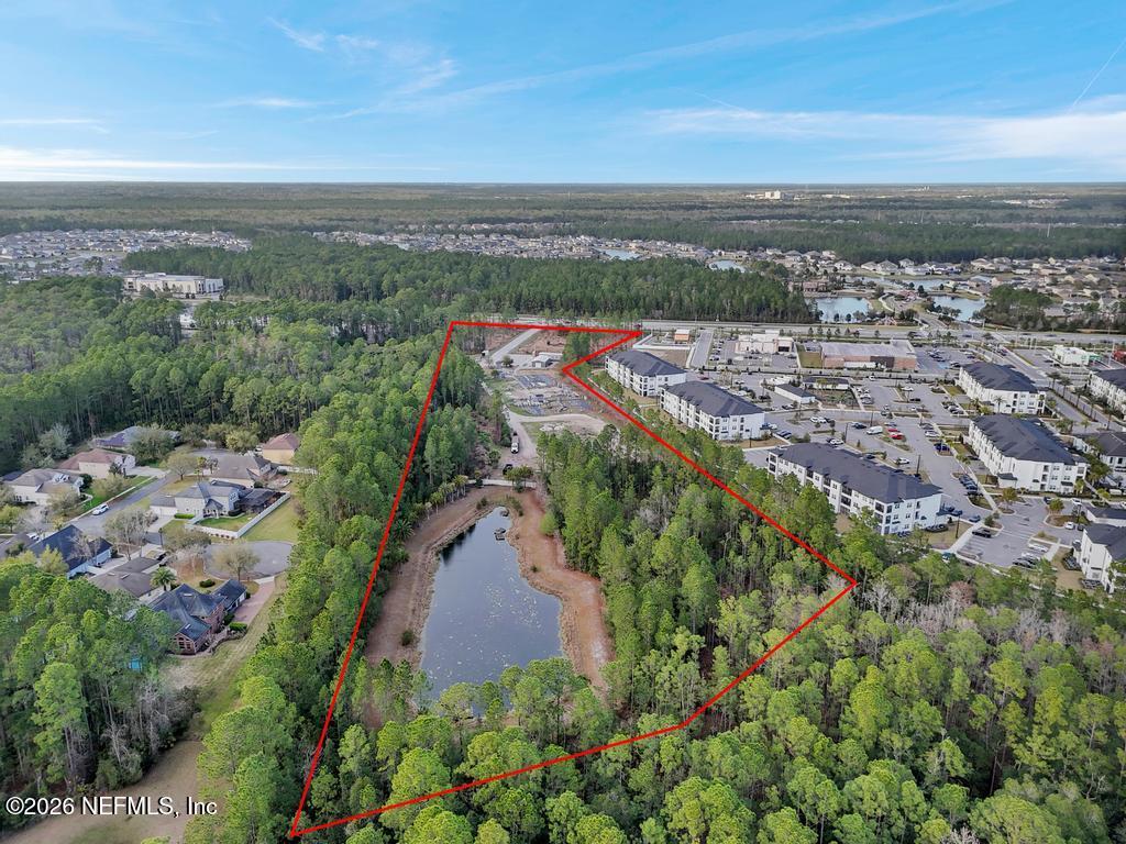 4280 Race Track Road St. Johns, FL 32259 - Photo 9 of 12 an aerial view of a city