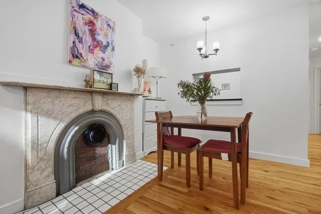 a view of a livingroom with furniture and wooden floor