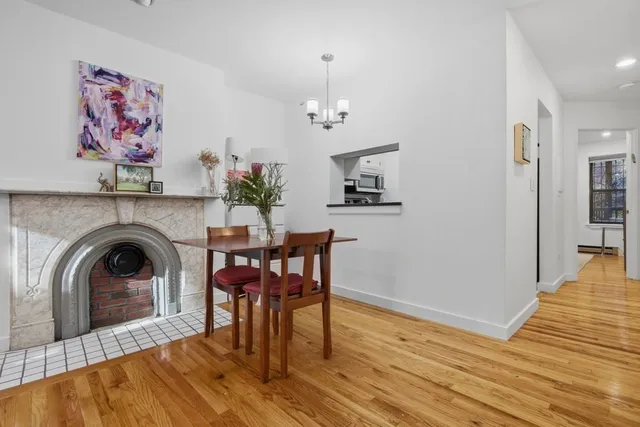 a view of a livingroom with furniture and wooden floor