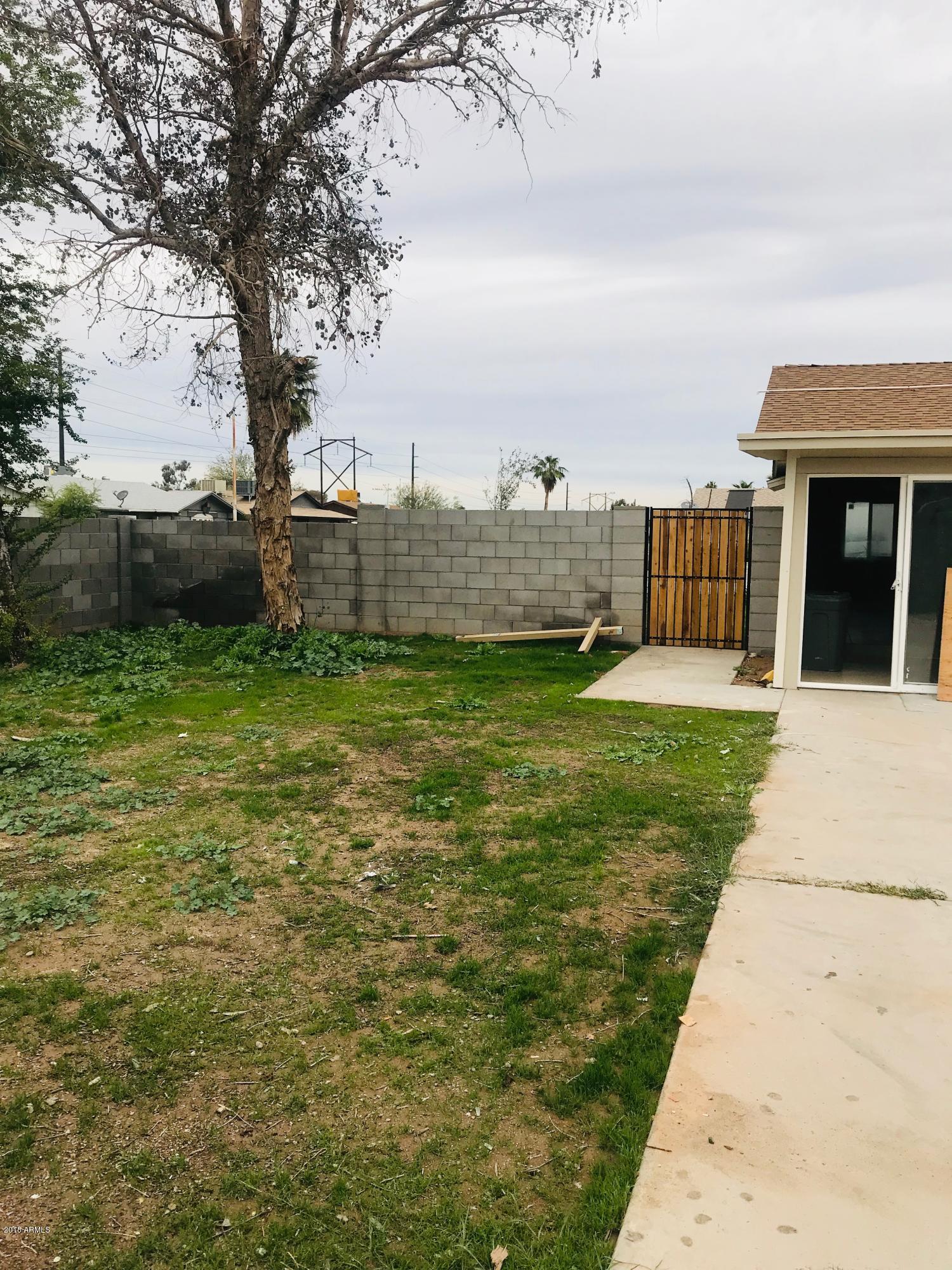 4621 East Wayland Road Phoenix, AZ 85040 - Photo 33 of 34 NEW BLOCK WALL, NEW GATE