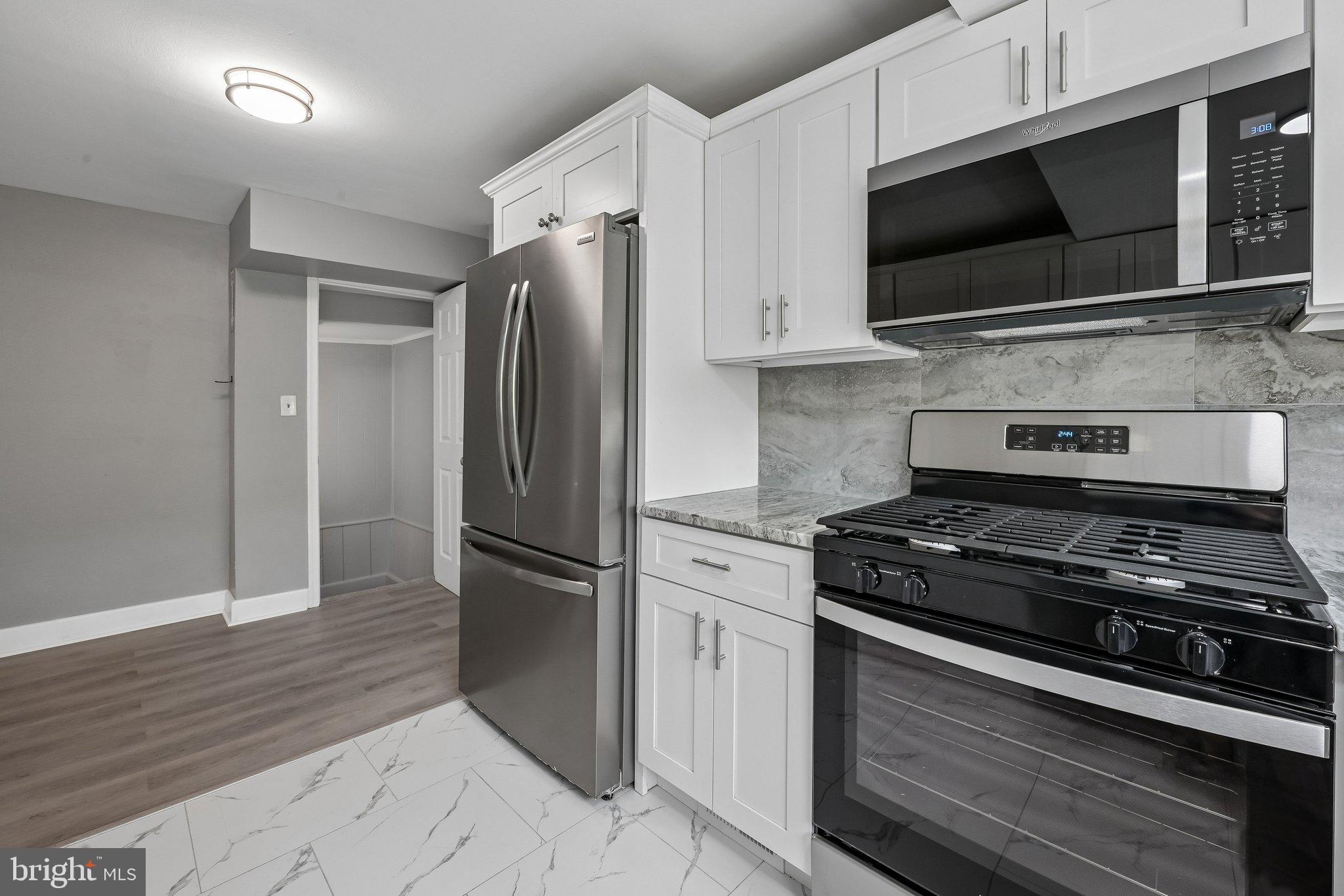 2872 Tuckahoe Road Camden, NJ 08104 - Photo 6 of 25 Modern kitchen with sleek finishes.