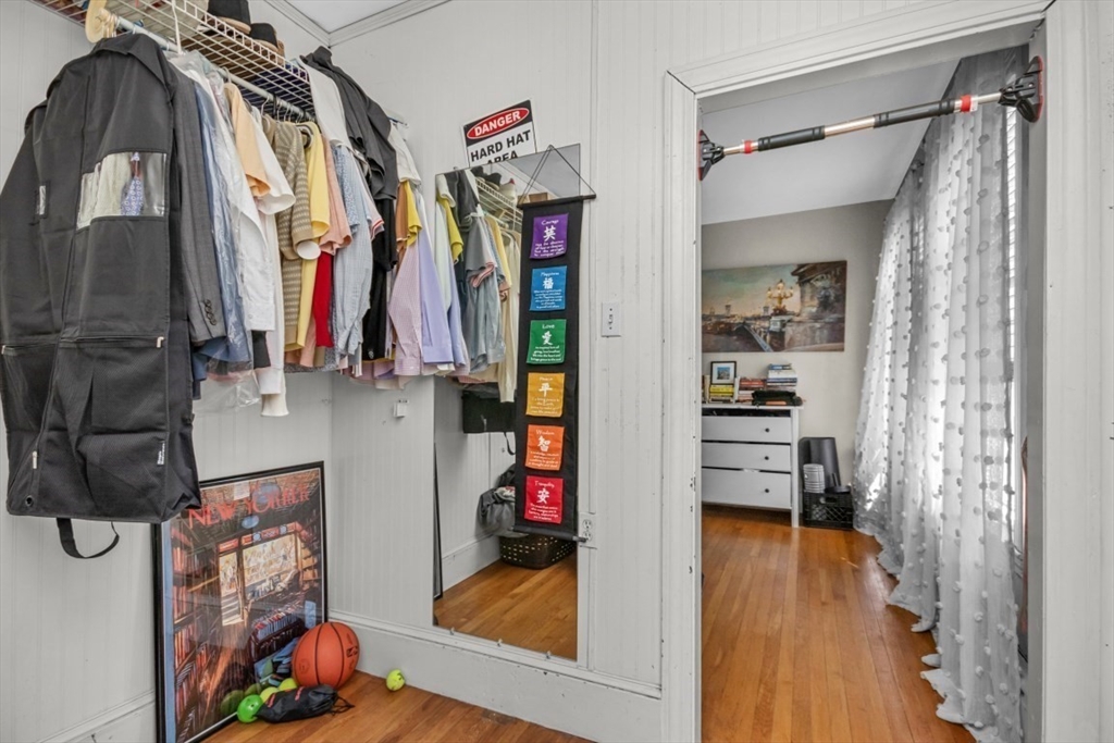 508 East 3rd Street, Unit 2 Boston, MA 02127 - Photo 11 of 17 a view of walk in closet with clothes and shoes