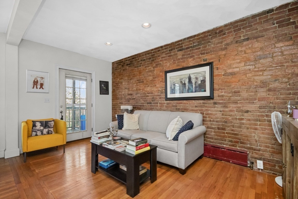 508 East 3rd Street, Unit 2 Boston, MA 02127 - Photo 5 of 17 a living room with furniture and wooden floor