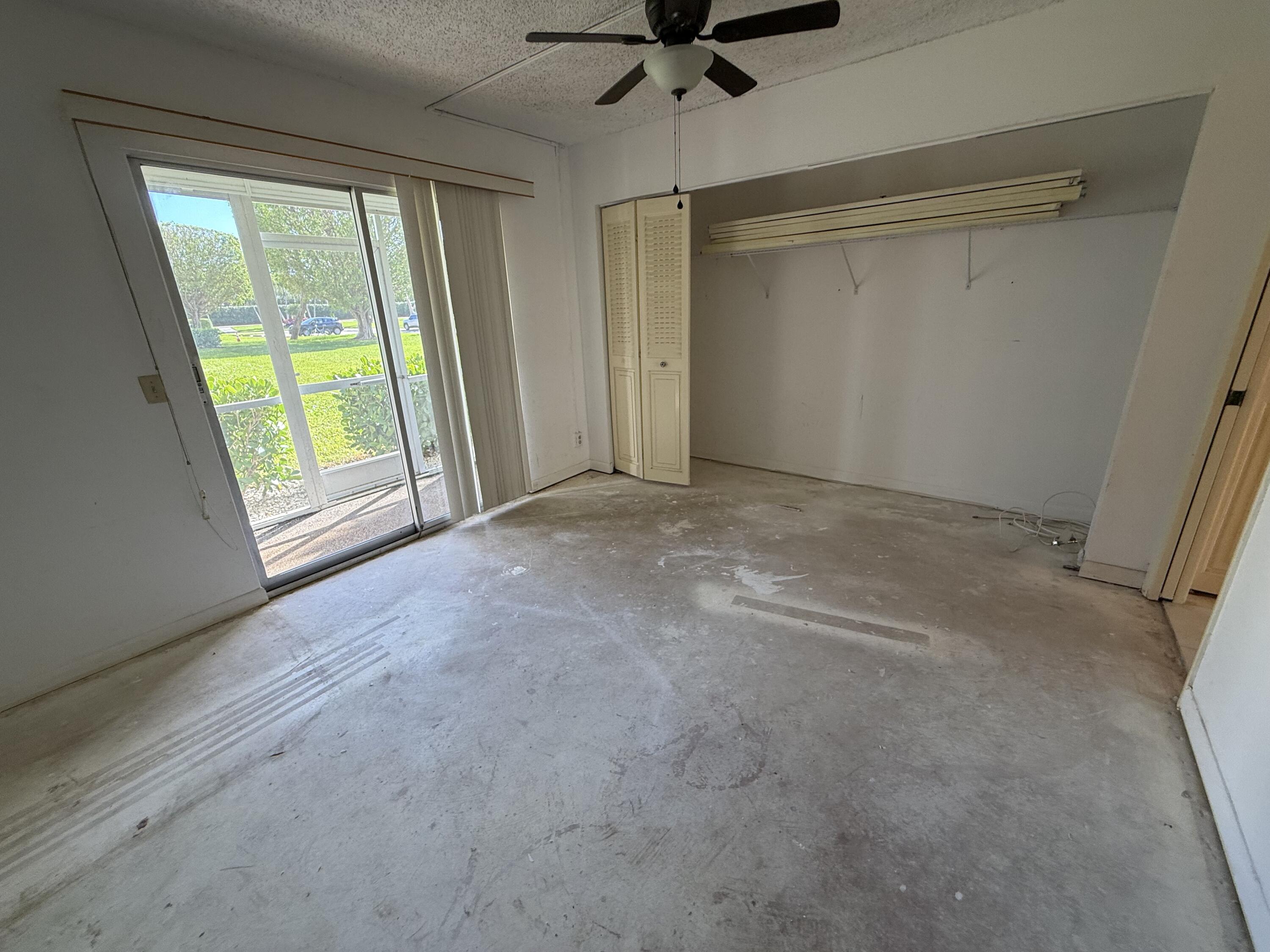 13 Dorset A Boca Raton, FL 33434 - Photo 28 of 69 a view of an empty room with a window