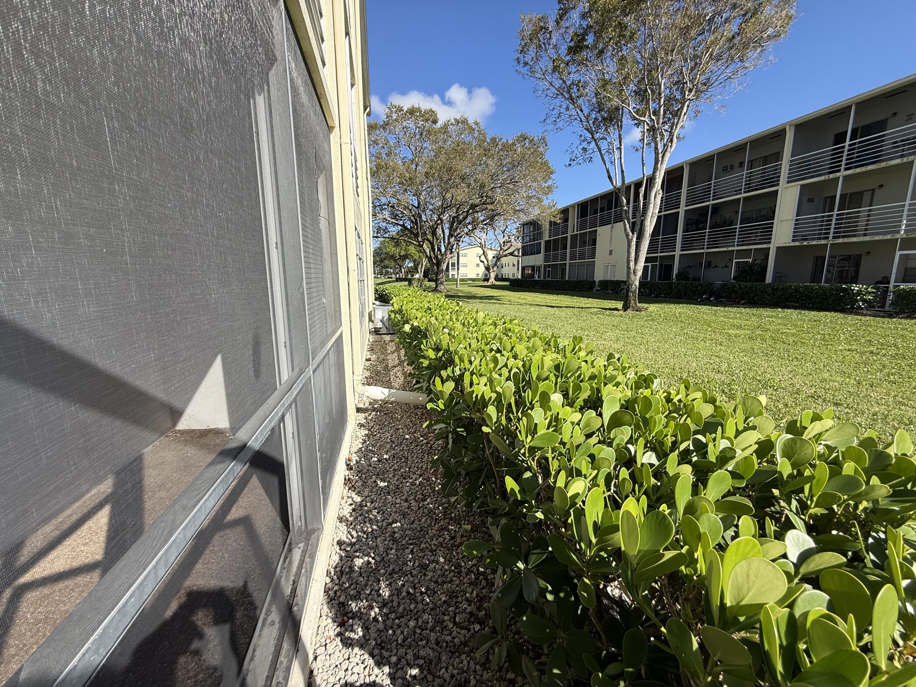 13 Dorset A Boca Raton, FL 33434 - Photo 34 of 69 a view of a house with a large window