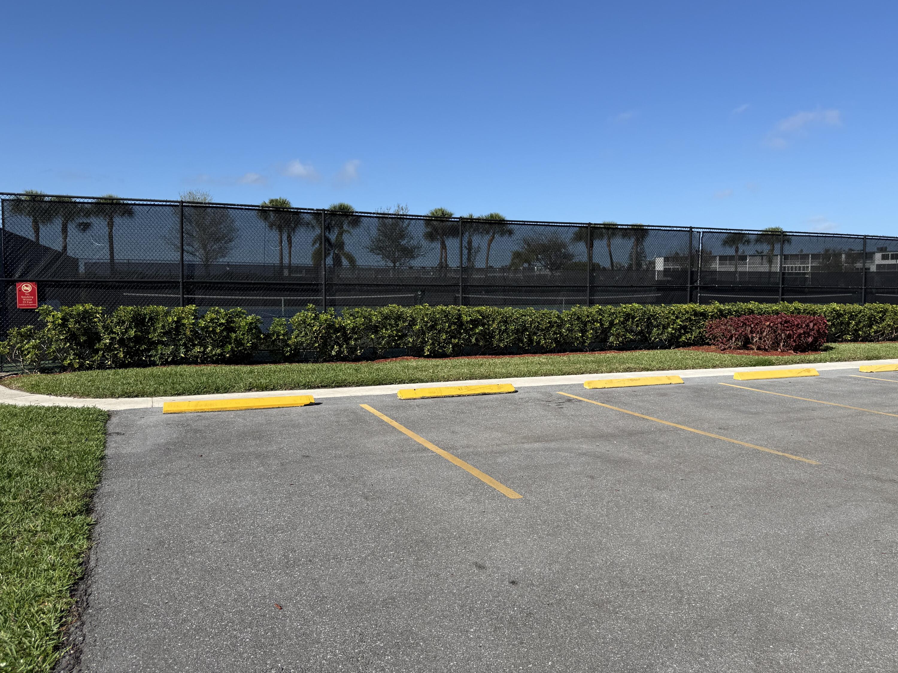 13 Dorset A Boca Raton, FL 33434 - Photo 46 of 69 a view of a swimming pool and a yard