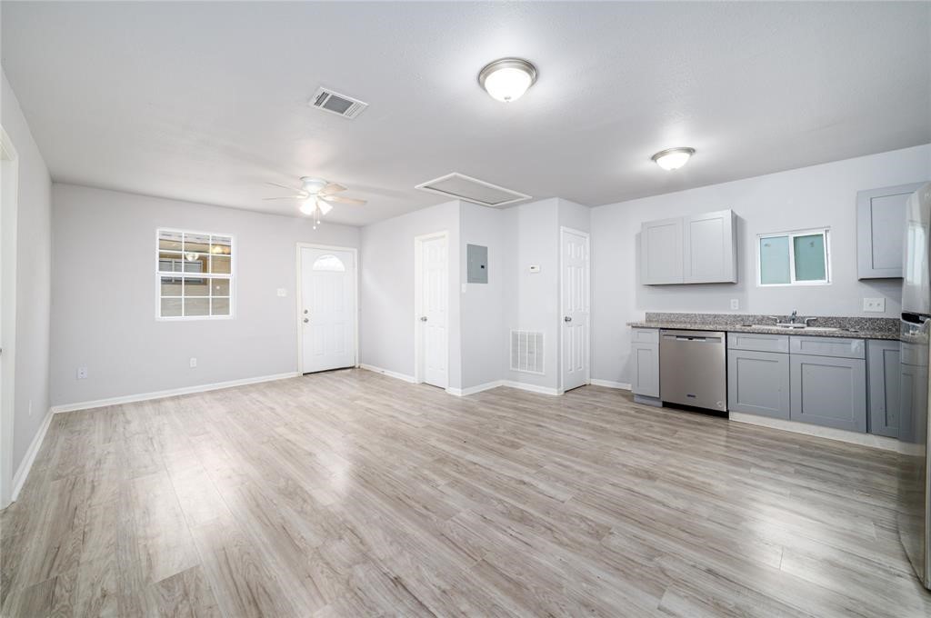 1309 Jefferson Street, Unit C Baytown, TX 77520 - Photo 4 of 9 a view of a kitchen with a sink and a window