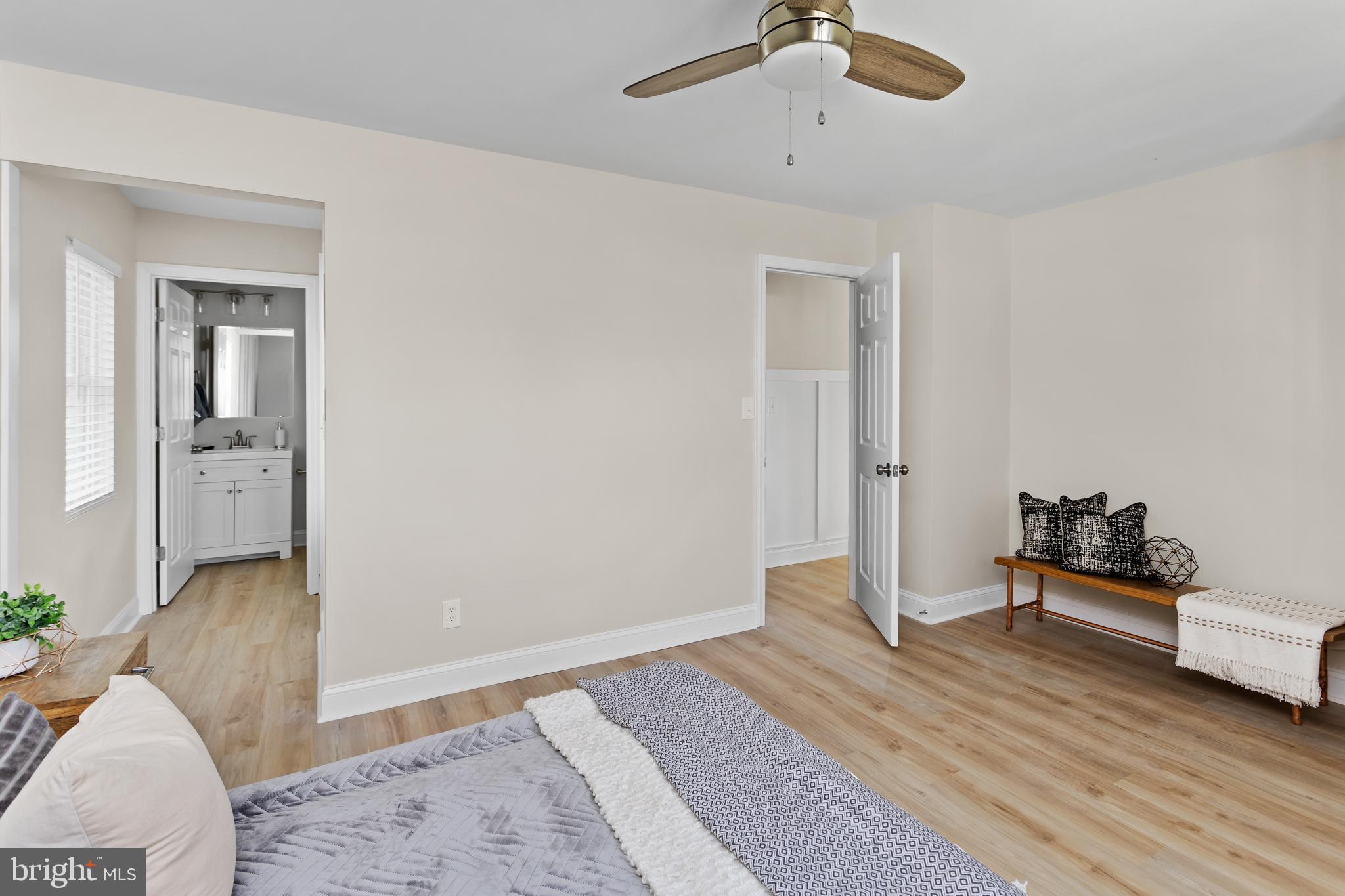 124 Gary Drive Hamilton, NJ 08690 - Photo 15 of 31 a bedroom with a bed and a couch