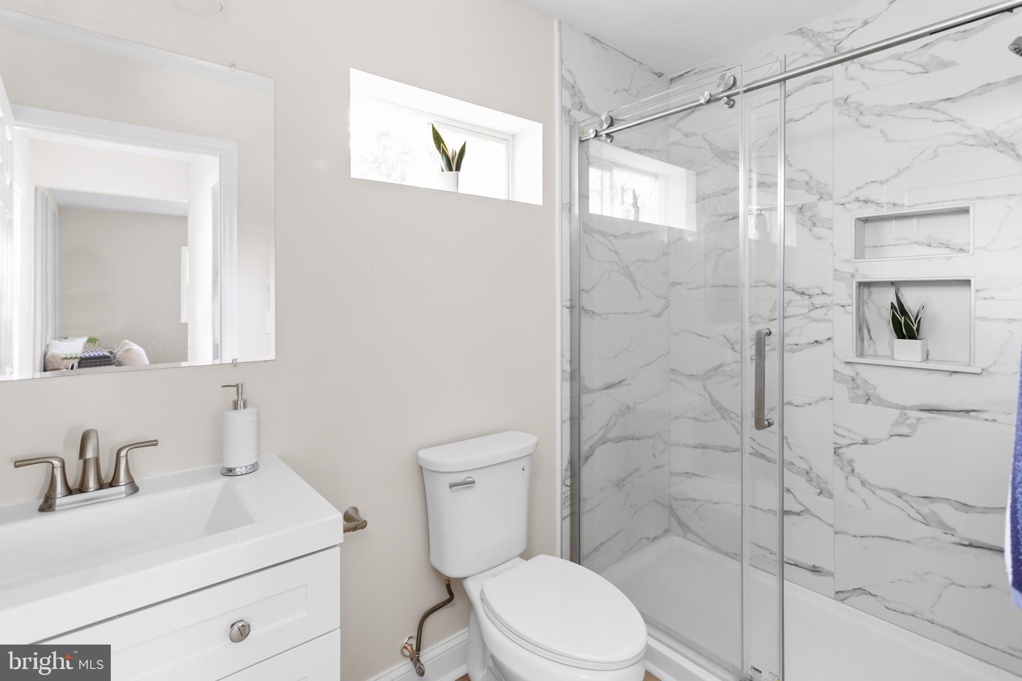 124 Gary Drive Hamilton, NJ 08690 - Photo 16 of 31 a bathroom with a sink toilet and shower