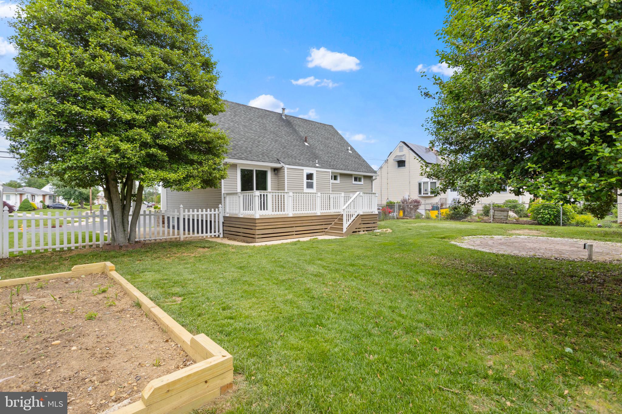124 Gary Drive Hamilton, NJ 08690 - Photo 24 of 31 a view of a house with a yard