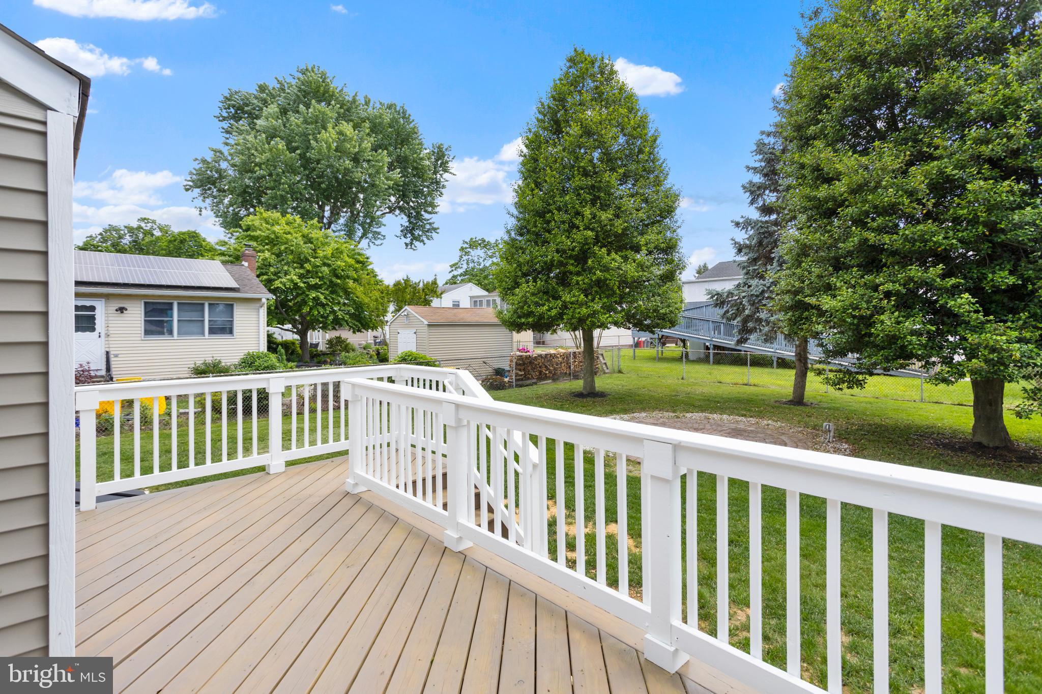 124 Gary Drive Hamilton, NJ 08690 - Photo 26 of 31 a view of a wooden roof deck
