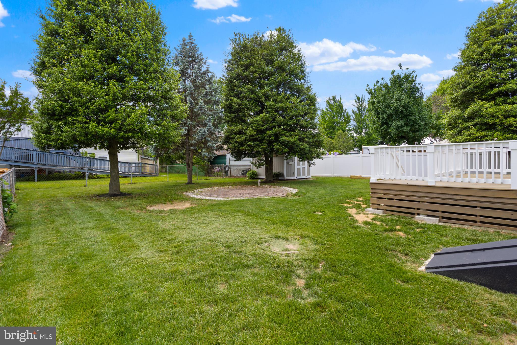 124 Gary Drive Hamilton, NJ 08690 - Photo 29 of 31 a view of a park with large trees