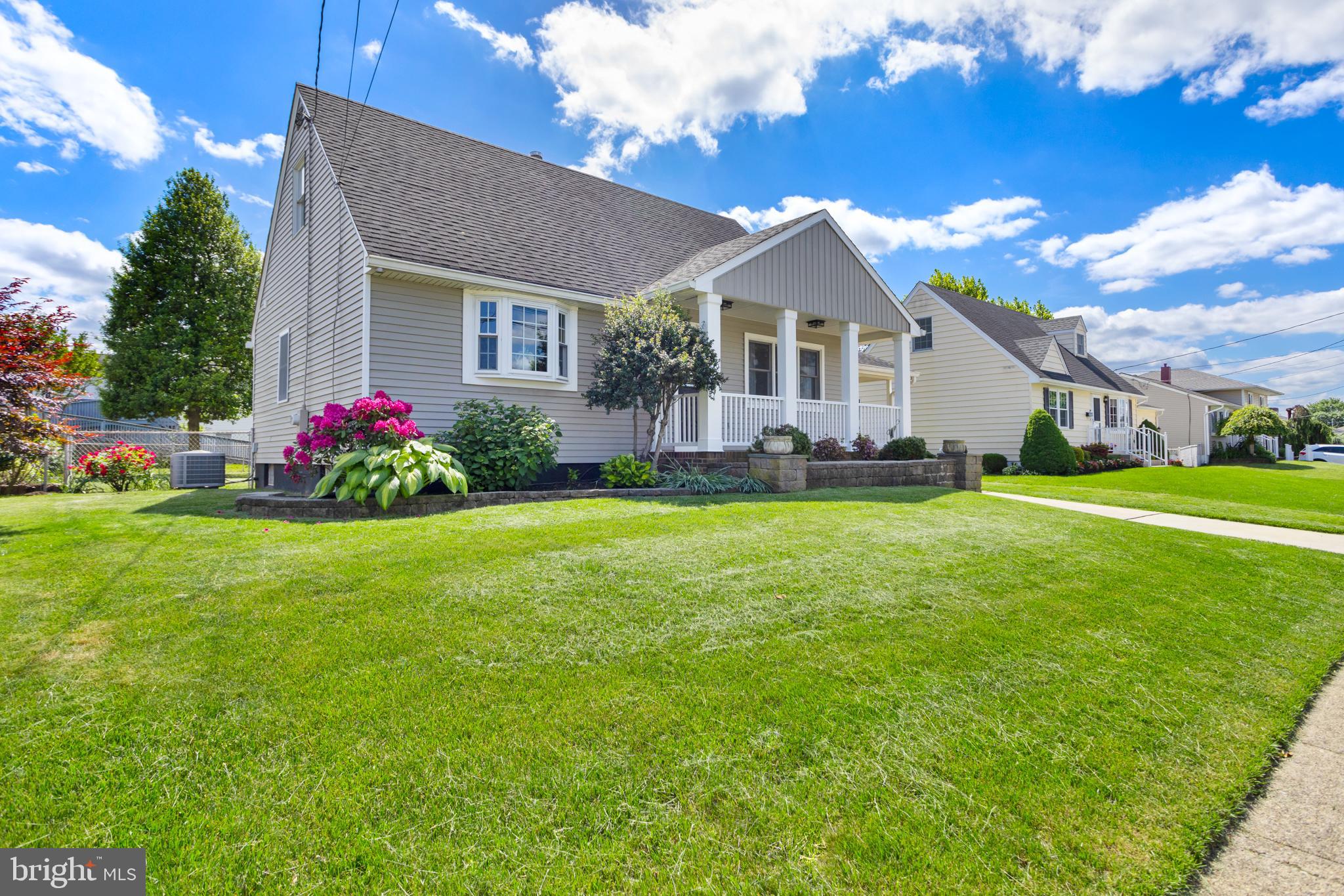 124 Gary Drive Hamilton, NJ 08690 - Photo 3 of 31 a front view of house with yard and green space