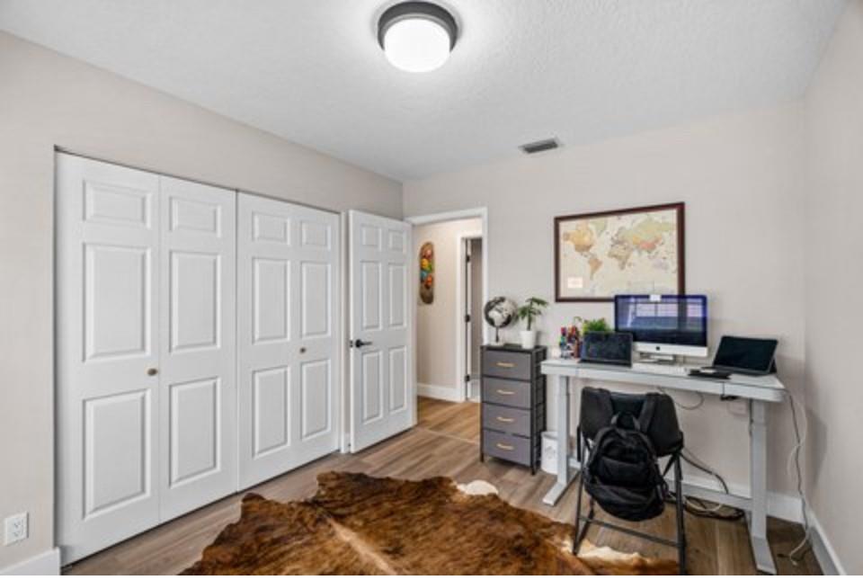 17282 Ventana Drive Boca Raton, FL 33487 - Photo 14 of 23 a view of a workspace with furniture and a window