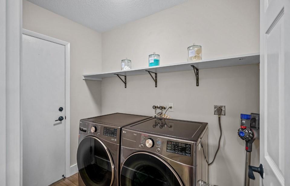 17282 Ventana Drive Boca Raton, FL 33487 - Photo 23 of 23 a utility room with dryer and washer