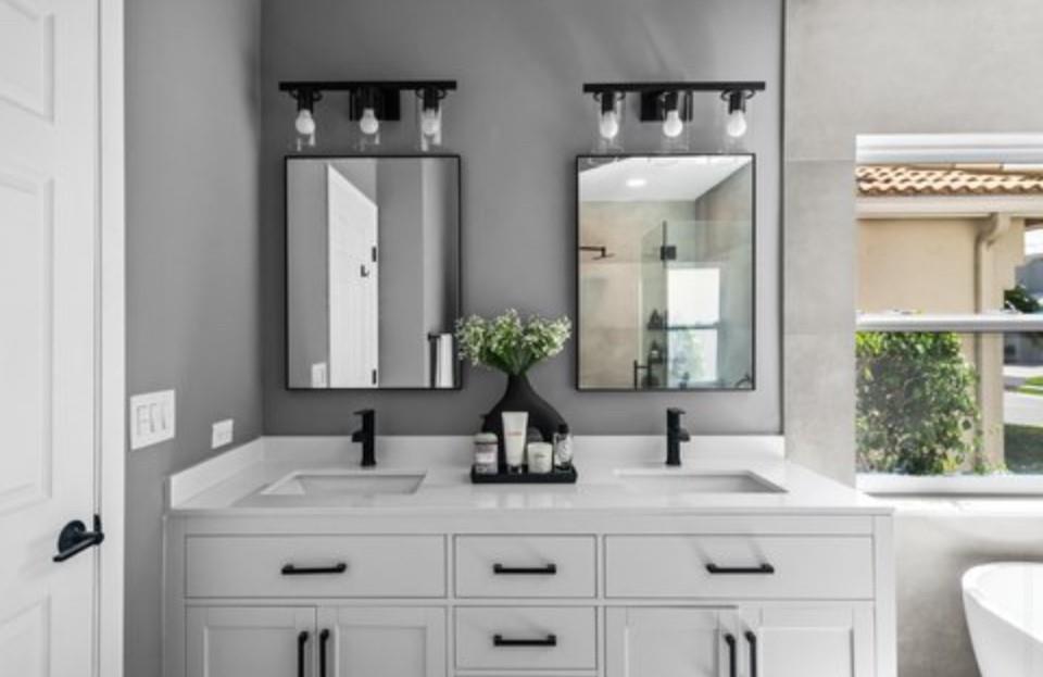 17282 Ventana Drive Boca Raton, FL 33487 - Photo 7 of 23 a bathroom with a sink and a mirror