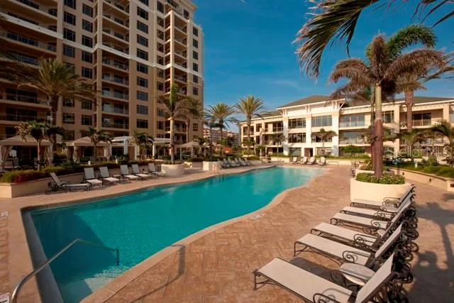 a view of a swimming pool with a patio