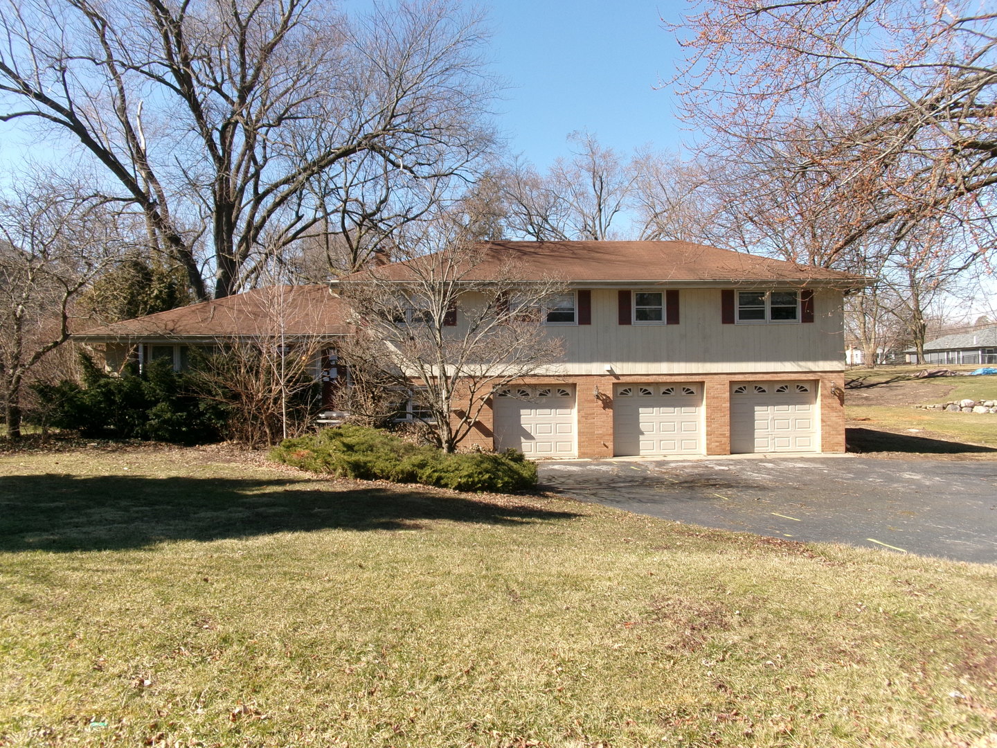 202 Elm Street Prospect Heights, IL 60070 - Photo 1 of 26 a front view of a house with a yard and lake view