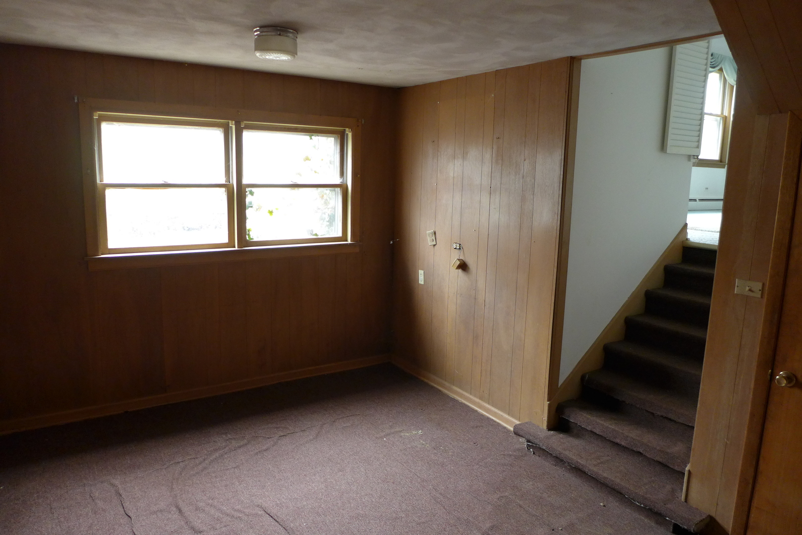 202 Elm Street Prospect Heights, IL 60070 - Photo 16 of 26 an empty room with windows