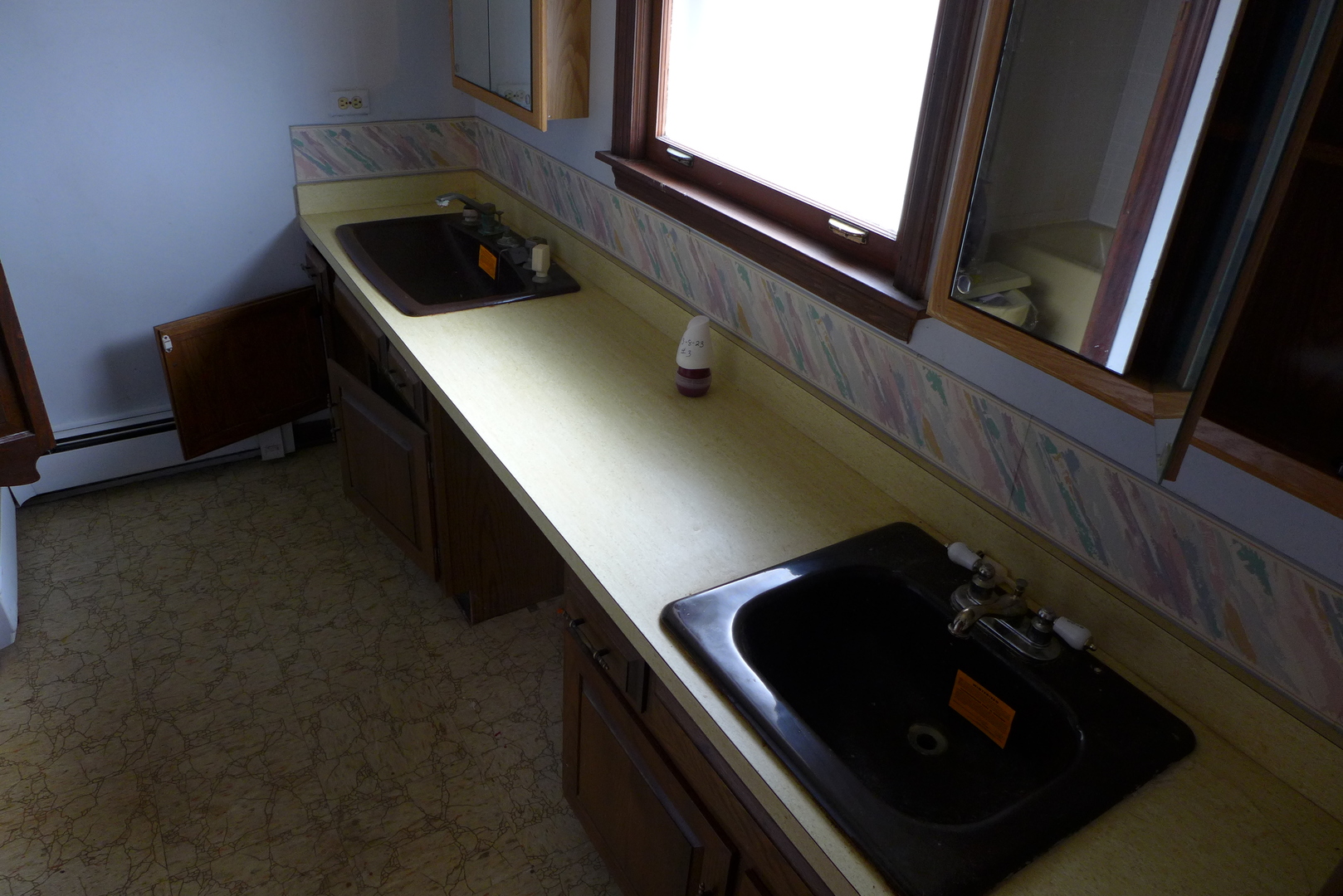 202 Elm Street Prospect Heights, IL 60070 - Photo 25 of 26 a close up of a sink and a stove