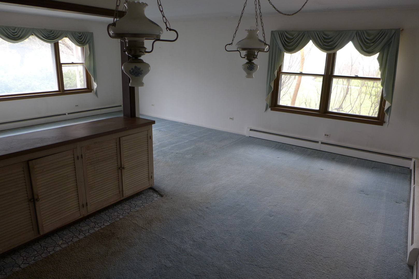 202 Elm Street Prospect Heights, IL 60070 - Photo 7 of 26 a view of an empty room and window
