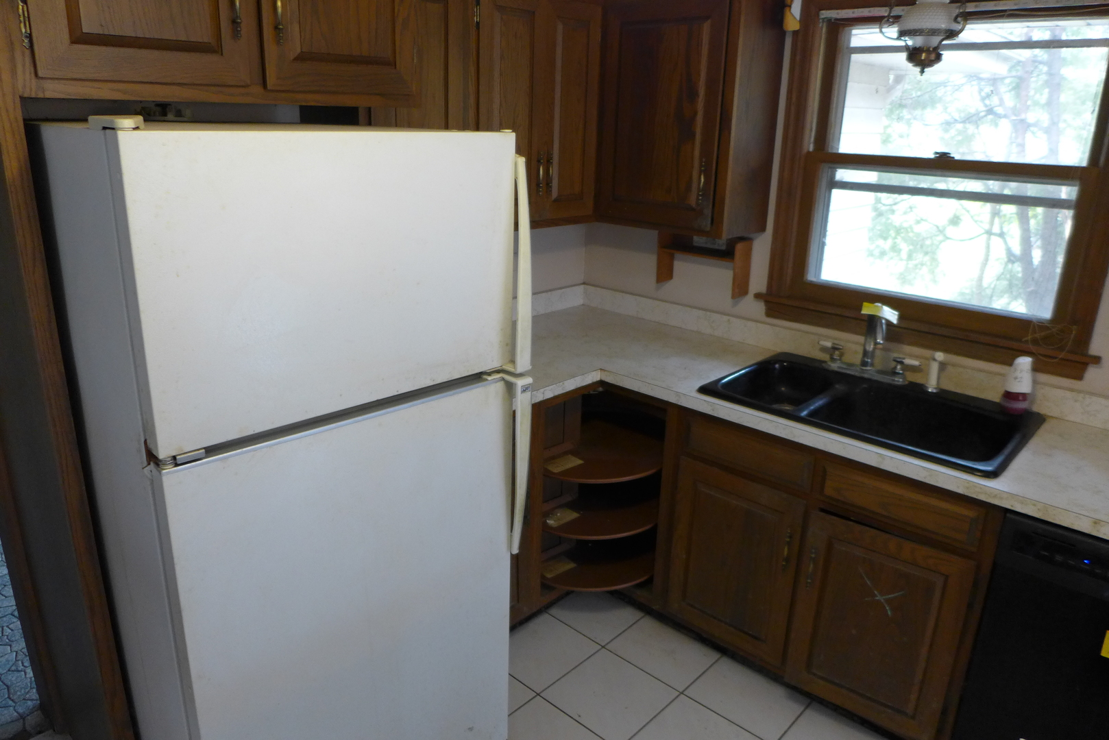 202 Elm Street Prospect Heights, IL 60070 - Photo 10 of 26 a kitchen with a refrigerator and a sink