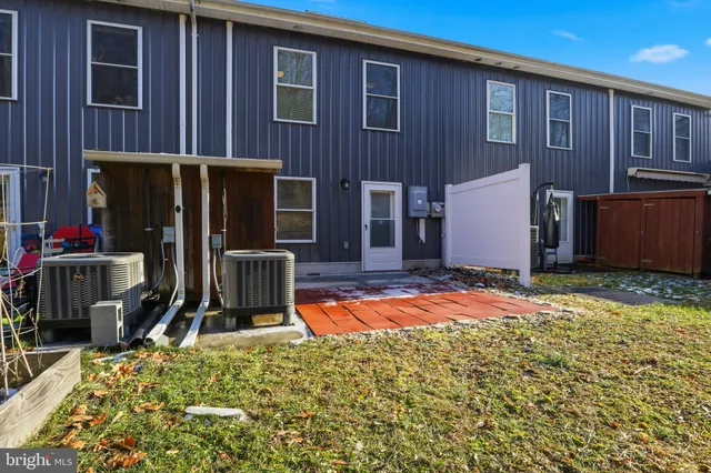 a backyard of a house with a yard