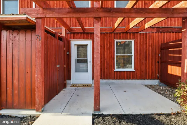 a view of backyard with a barn
