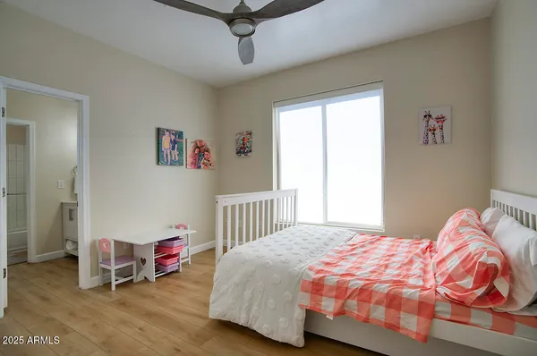 a bathroom with a sink double vanity and a mirror