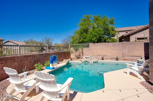a view of a house with backyard porch and patio