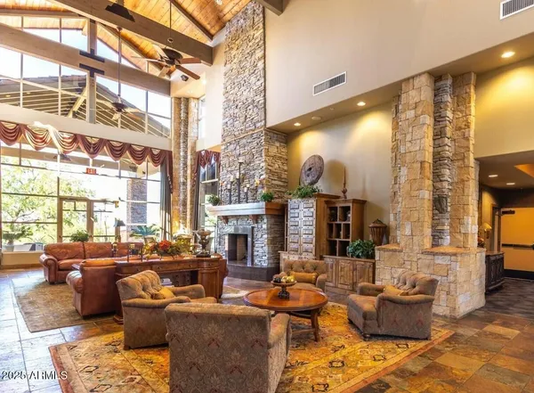 a view of swimming pool with a patio