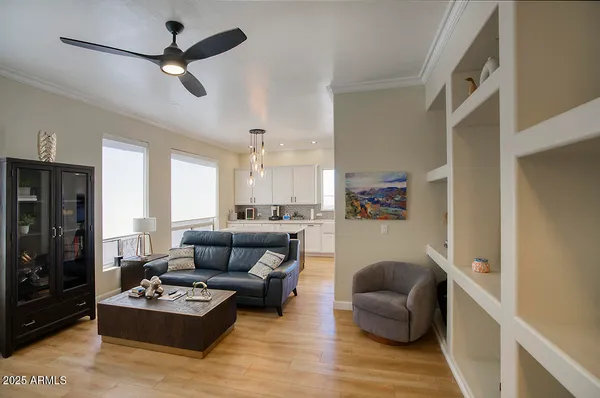 a living room with furniture and a window