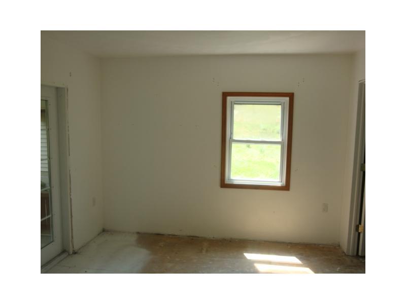 637 Butler Road Kittanning, PA 16201 - Photo 6 of 10 Dining Room. DINING ROOM WITH FRENCH DOORS LEADING OUT TO THE LARGE PORCH.