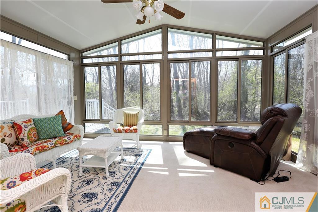 543 Georges Road Dayton, NJ 08810 - Photo 19 of 23 a living room with furniture and a large window
