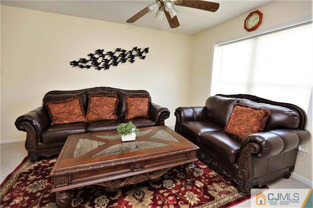 543 Georges Road Dayton, NJ 08810 - Photo 4 of 23 a living room with furniture