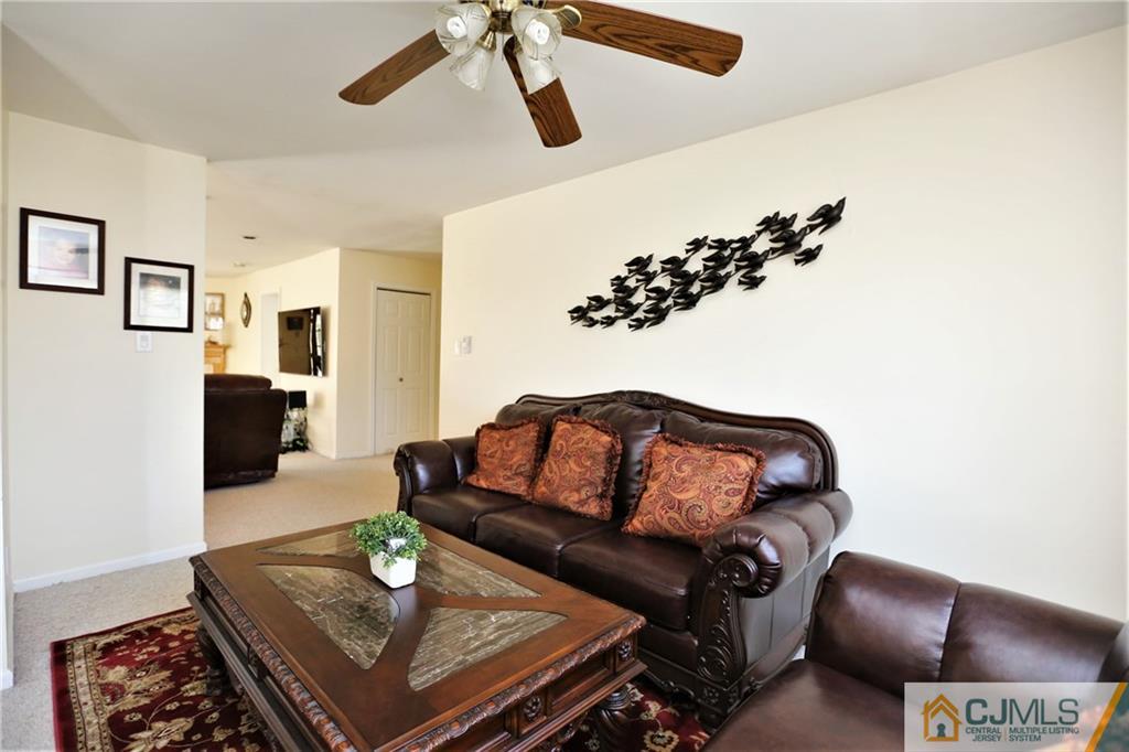 543 Georges Road Dayton, NJ 08810 - Photo 5 of 23 a living room with furniture