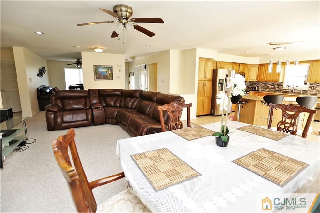 543 Georges Road Dayton, NJ 08810 - Photo 9 of 23 a living room with furniture and a table