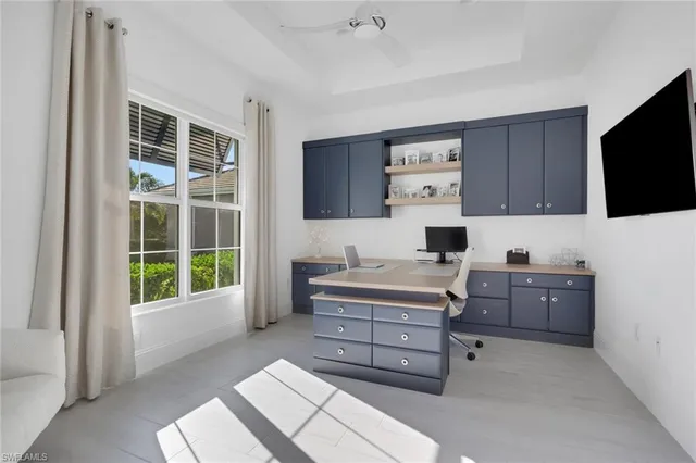 a room with furniture window and flat screen tv