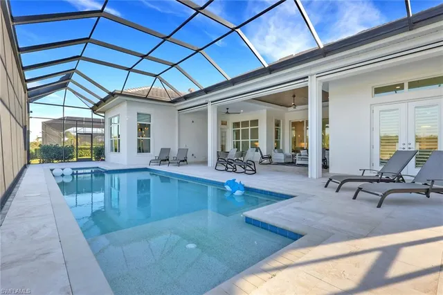 a view of a living room and dining room