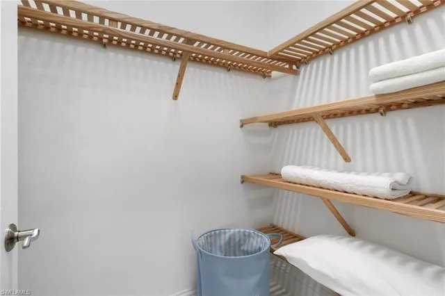 a bathroom with a toilet and a shower curtain