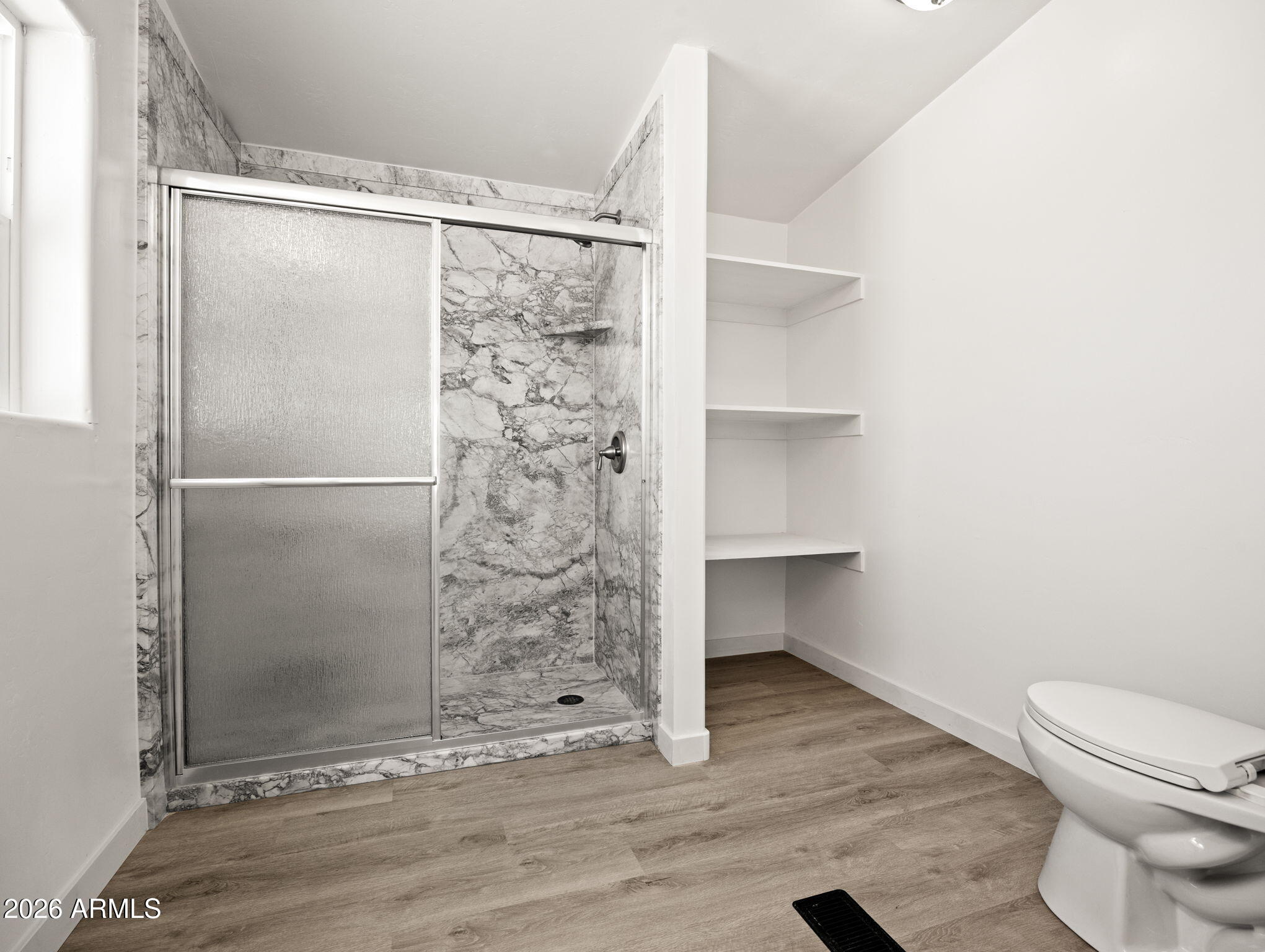 1754 West Deadwood Ranch Road Paulden, AZ 86334 - Photo 28 of 51 a bathroom with a shower and a toilet